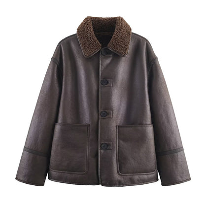 Manteau  en cuir et fourrure