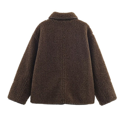 Manteau  en cuir et fourrure
