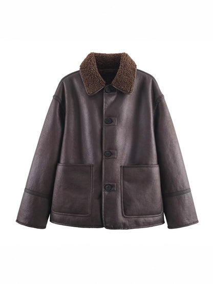 Manteau  en cuir et fourrure